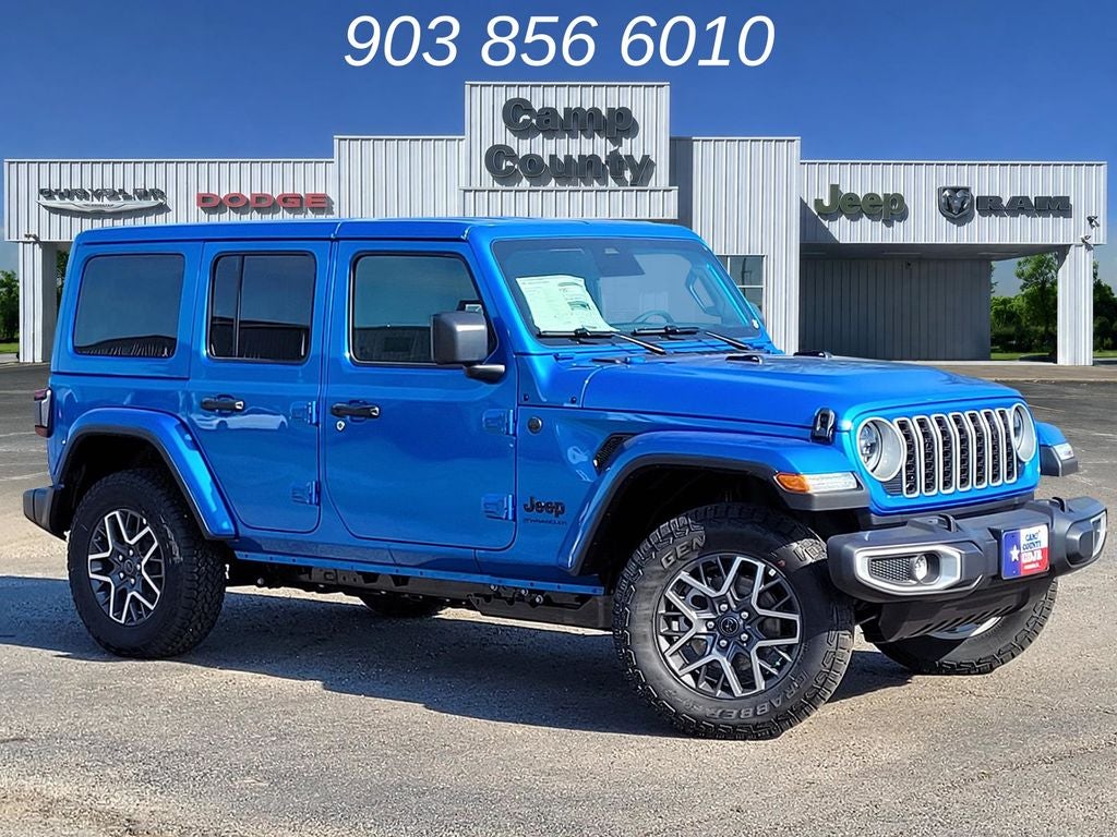 2026 Jeep Wrangler Sahara in Hydro Blue Pearl Coat — front three-quarter view