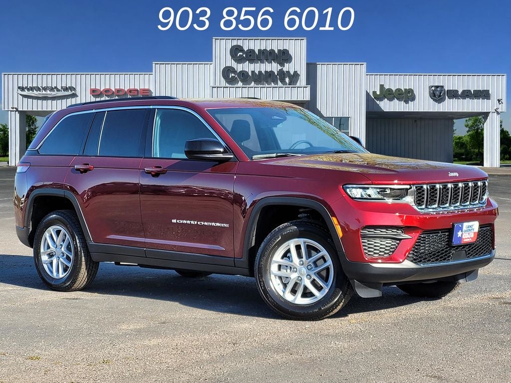2026 Jeep Grand Cherokee Laredo in Velvet Red Pearlcoat — front three-quarter view