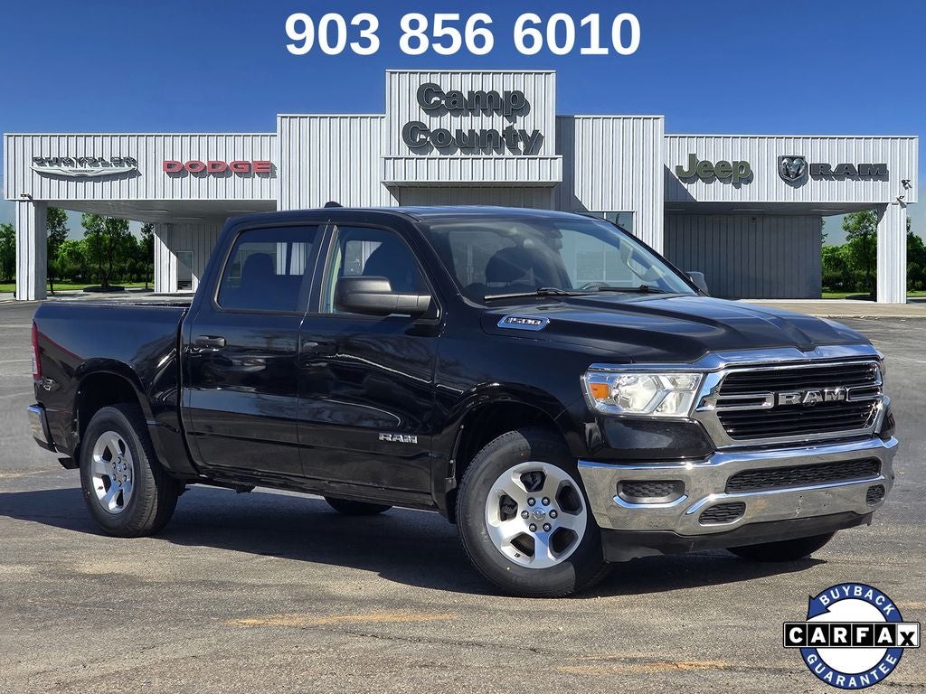 2019 RAM 1500 Tradesman in Diamond Black Crystal Pearlcoat — front three-quarter view