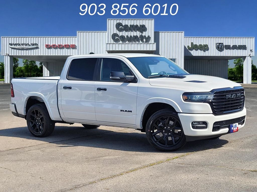 2026 RAM 1500 Laramie in Ivory White Tri-Coat Pearlcoat — front three-quarter view