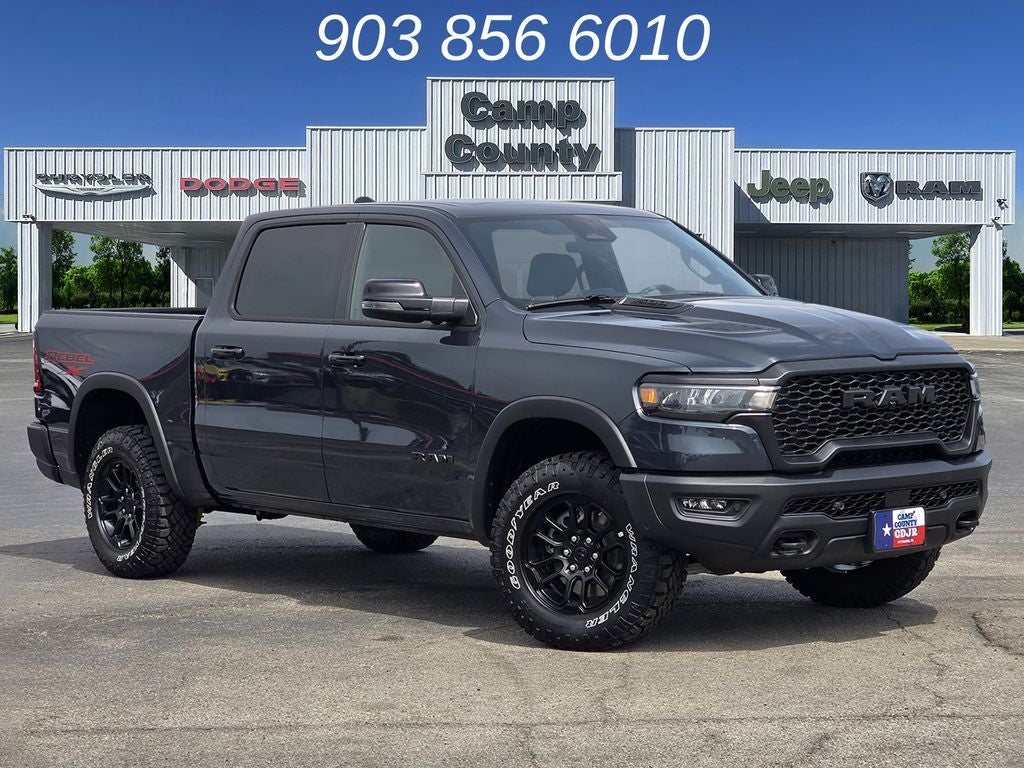 2026 RAM 1500 Rebel in Forged Blue Metallic — front three-quarter view