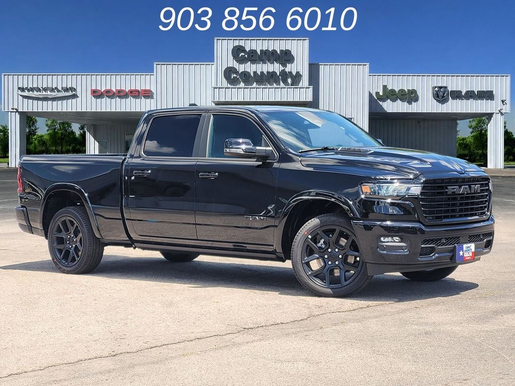 2026 RAM 1500 Laramie in Diamond Black Crystal Pearlcoat — front three-quarter view