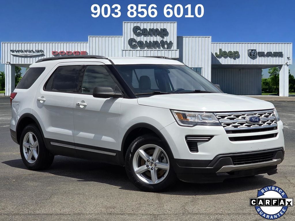 2019 Ford Explorer XLT in Oxford White — front three-quarter view