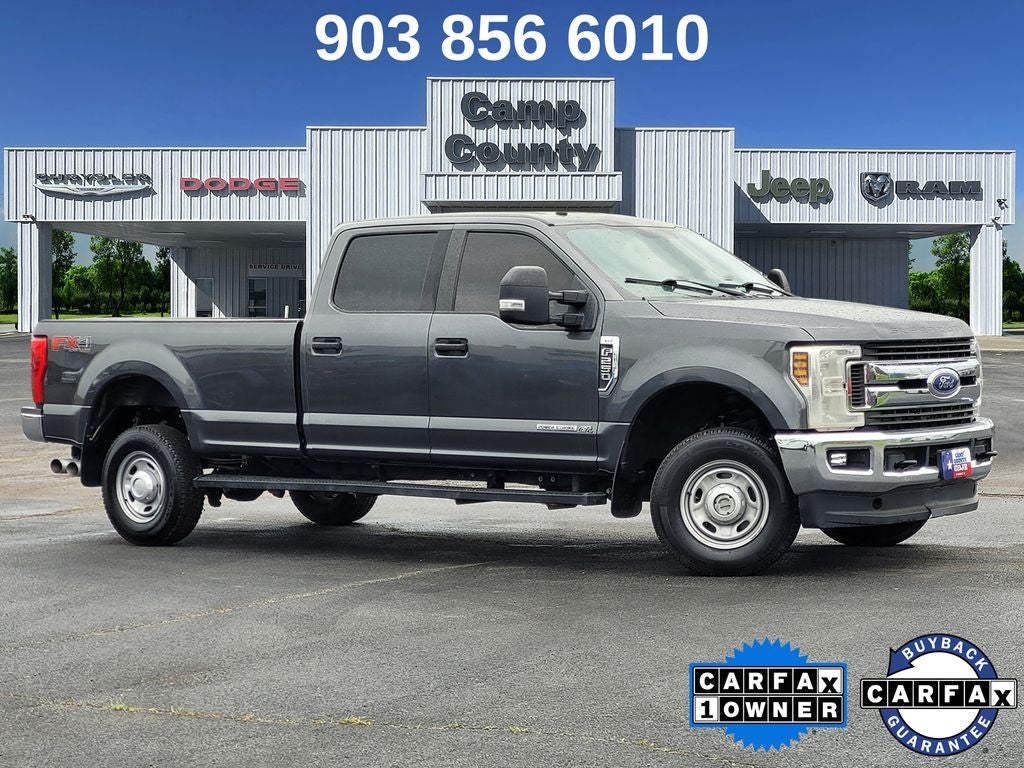 2019 Ford F-250SD XLT in Magnetic — front three-quarter view