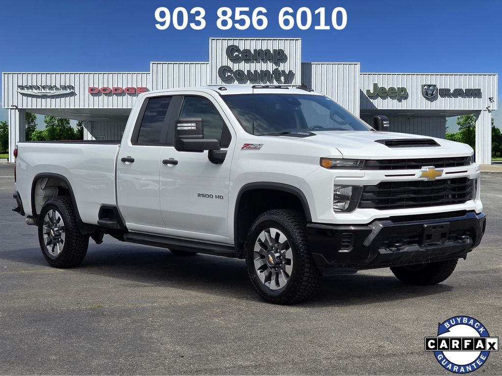 2024 Chevrolet Silverado 2500HD Custom in Summit White — front three-quarter view