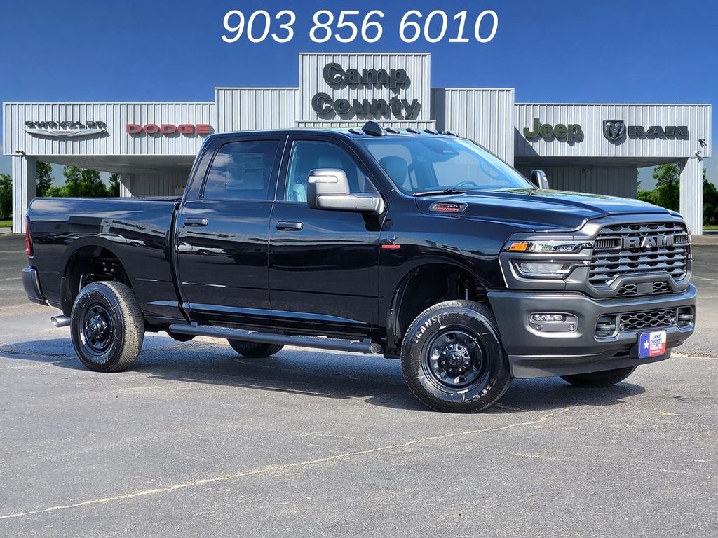 2026 RAM 2500 Tradesman in Diamond Black Crystal Pearlcoat — front three-quarter view