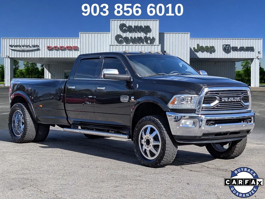 2018 RAM 3500 Laramie Longhorn in Brilliant Black Crystal Pearlcoat — front three-quarter view