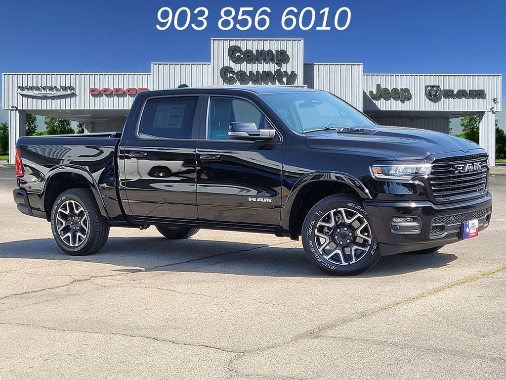 2026 RAM 1500 Laramie in Diamond Black Crystal Pearlcoat — front three-quarter view