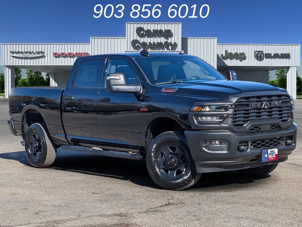 2026 RAM 2500 Tradesman in Diamond Black Crystal Pearlcoat — front three-quarter view