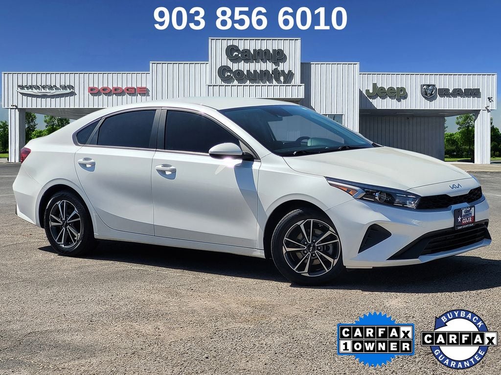 2024 Kia Forte LXS in Snow White Pearl — front three-quarter view
