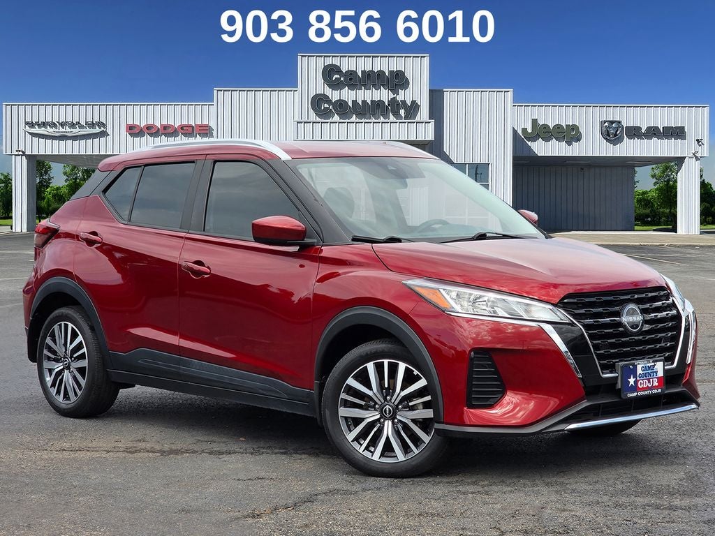 2024 Nissan Kicks SV in Scarlet Ember Tintcoat — front three-quarter view