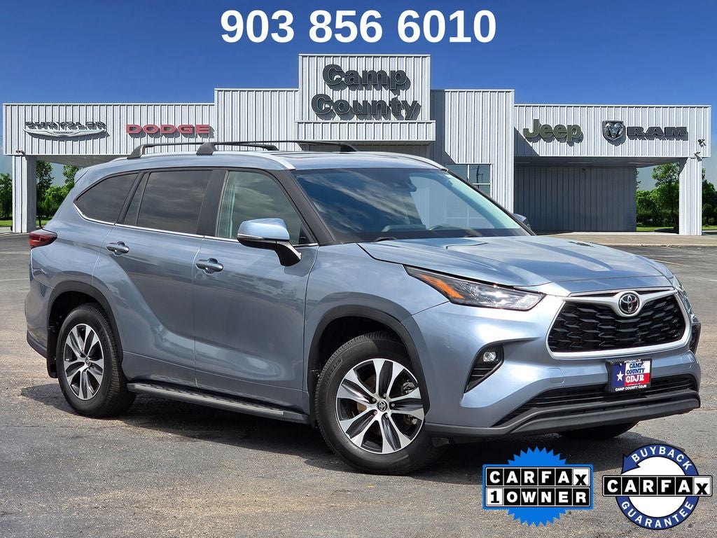 2024 Toyota Highlander XLE in Moon Dust — front three-quarter view