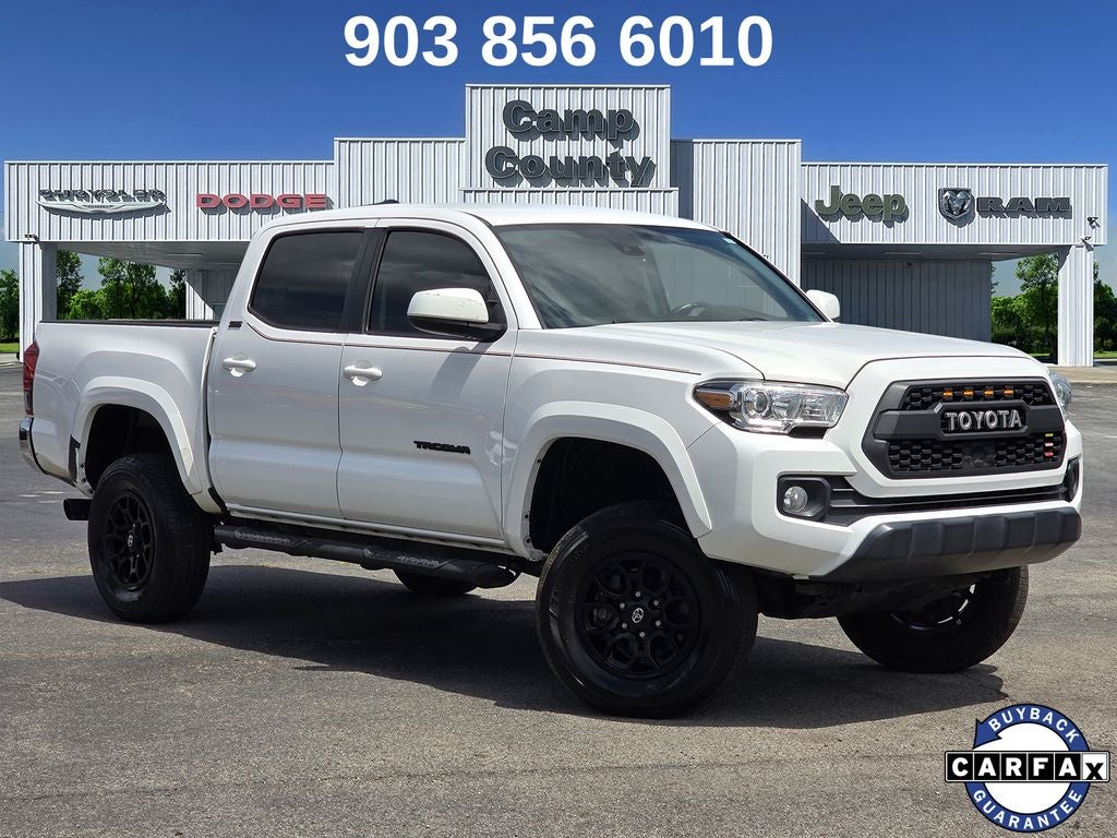 2021 Toyota Tacoma SR5 V6 in Super White — front three-quarter view
