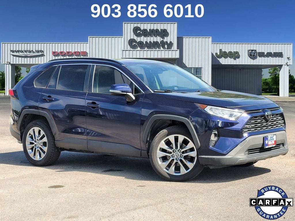 2020 Toyota RAV4 XLE Premium in Blueprint — front three-quarter view